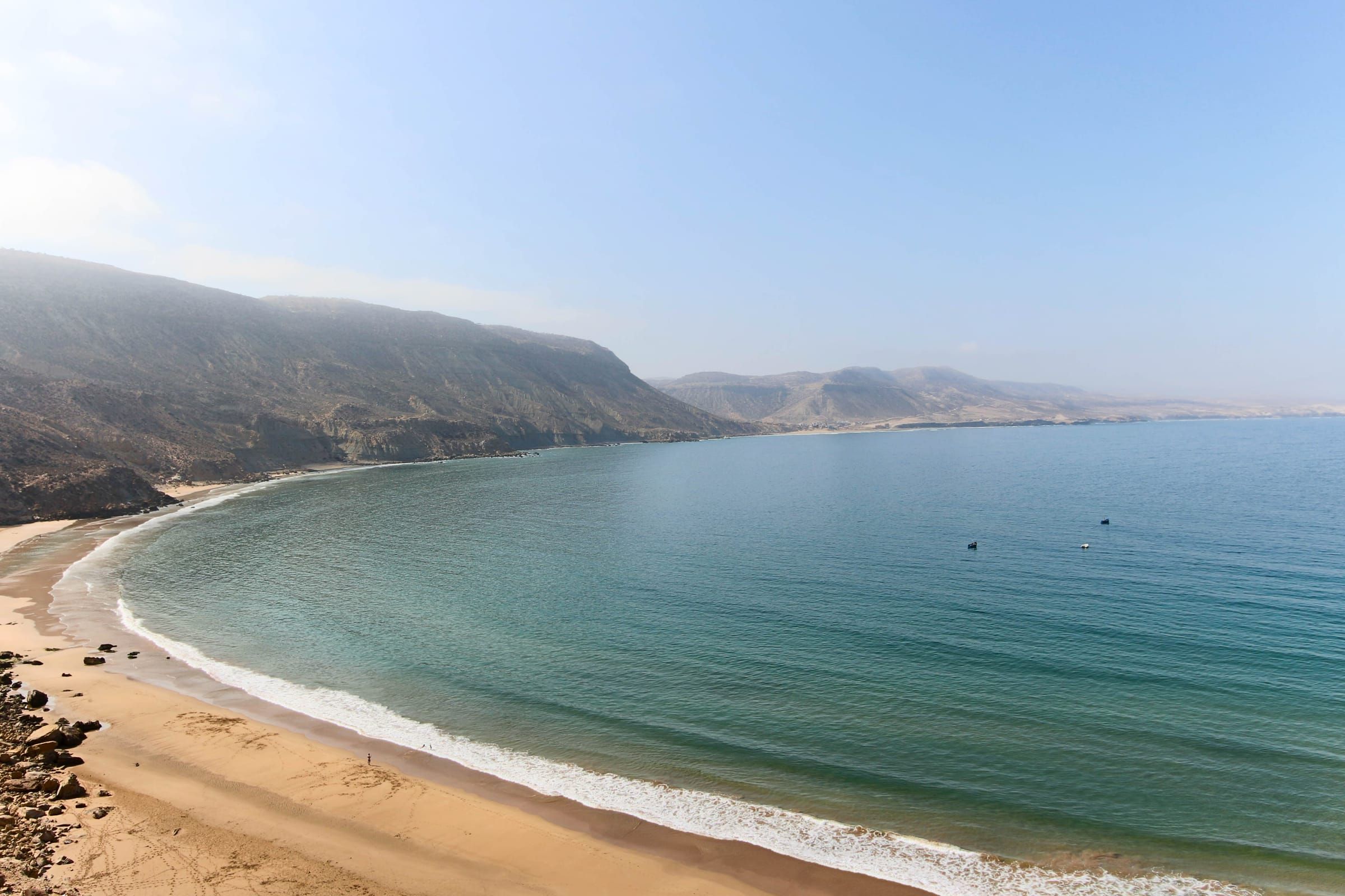 The beach of the bay seen from the cliff