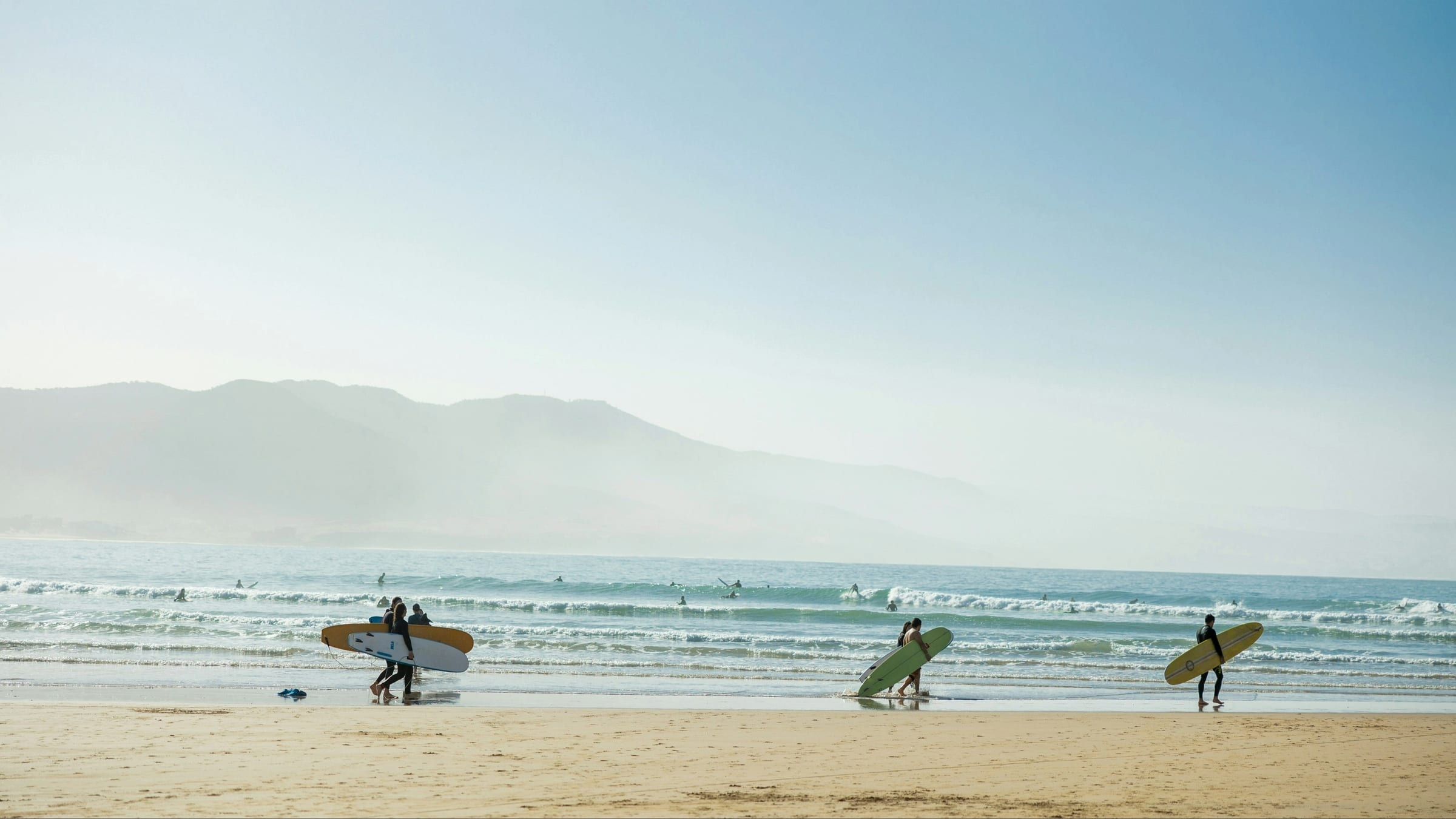 Surf session starting from the beach in Imsouane, Morocco