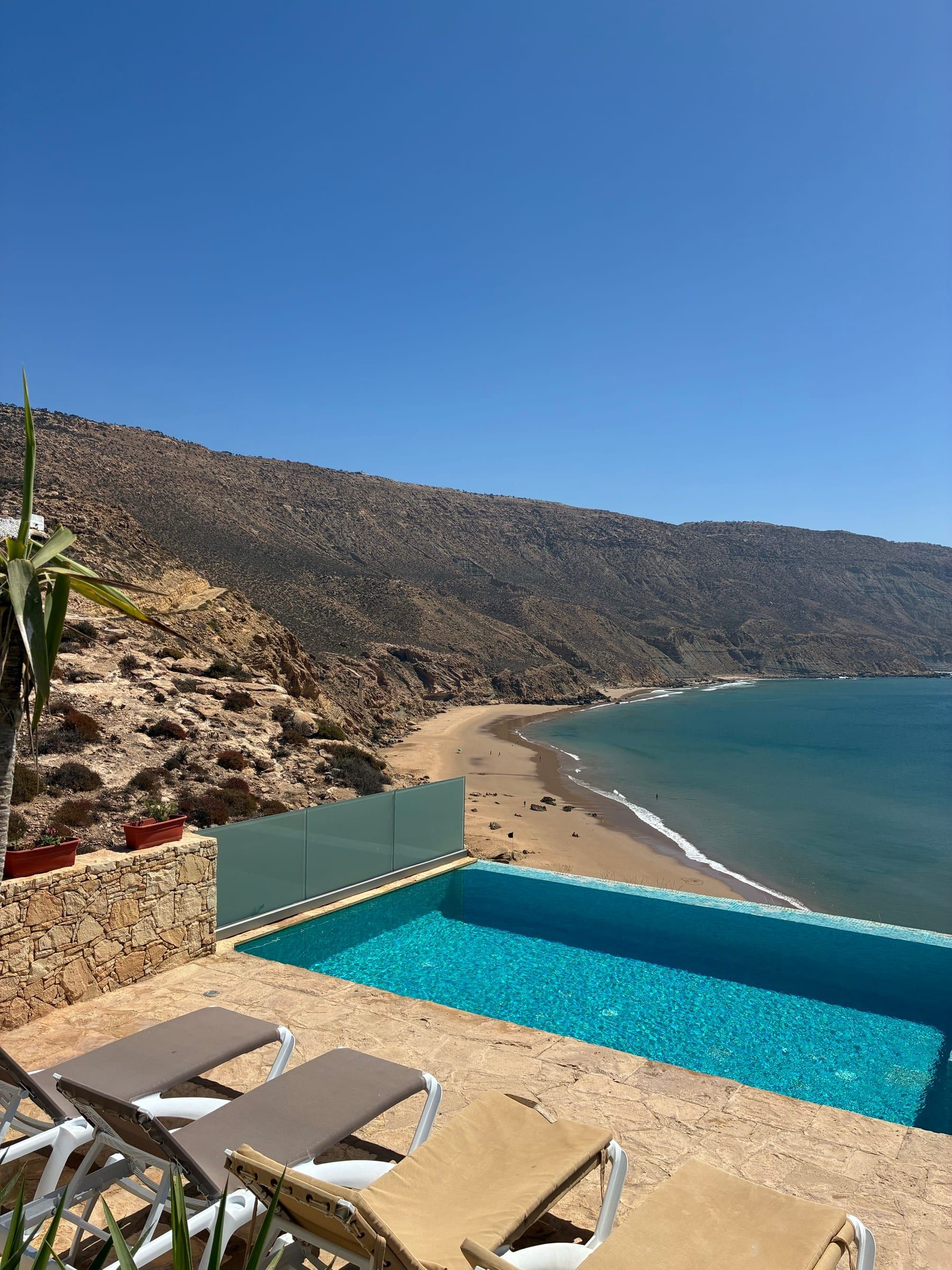 The infinity pool above the beach